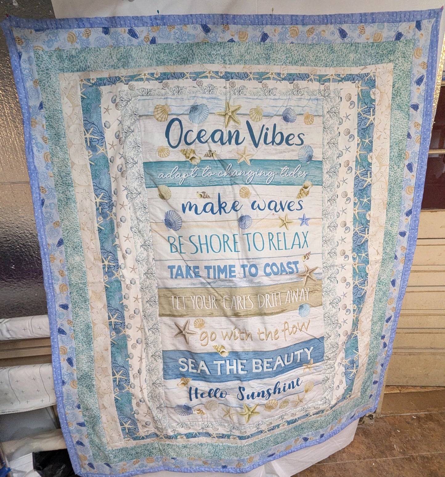 Ocean Vibes and Sea Shell lap quilt