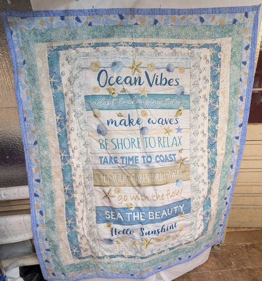 Ocean Vibes and Sea Shell lap quilt